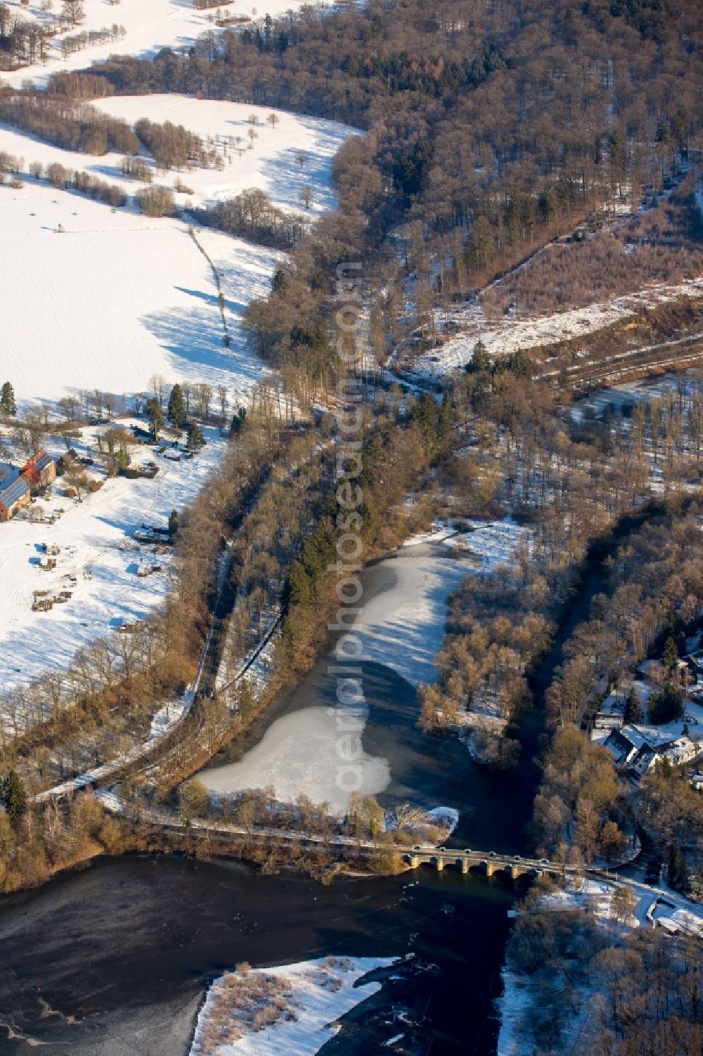 Aerial image Möhnesee - Wintry snow-covered scenery by the river - bridge building work Wameler bridge about the Moehne in the district of Voellinghausen in Moehnesee in the federal state North Rhine-Westphalia