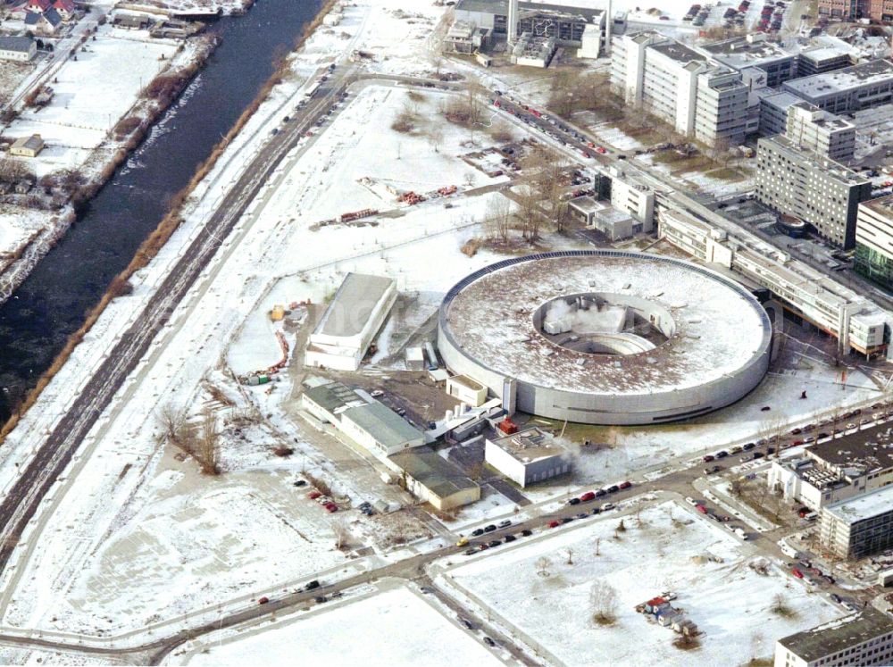 Berlin from above - Wintry snowy research building and office complex Elektronen- Speicherring BESSY - Synchrotronstrahlungsquelle in the district Adlershof in Berlin, Germany