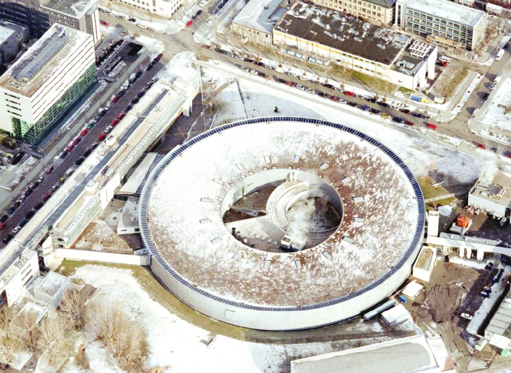 Aerial image Berlin - Wintry snowy research building and office complex Elektronen- Speicherring BESSY - Synchrotronstrahlungsquelle in the district Adlershof in Berlin, Germany