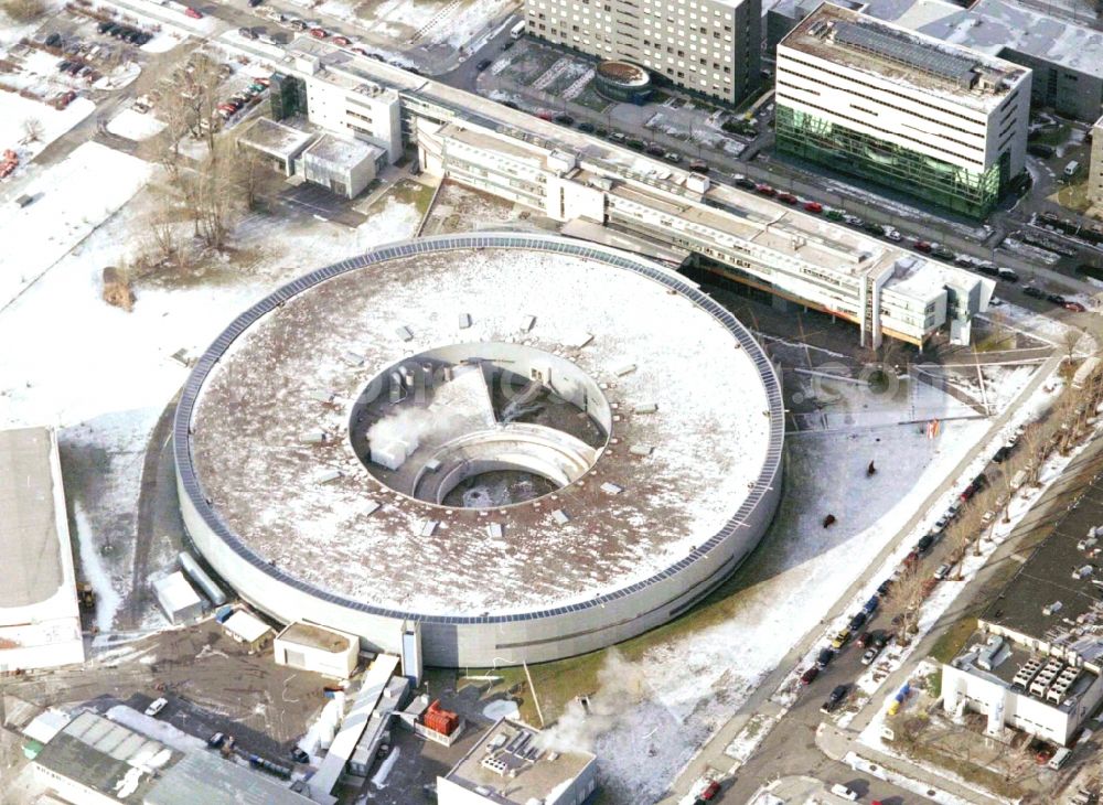 Berlin from the bird's eye view: Wintry snowy research building and office complex Elektronen- Speicherring BESSY - Synchrotronstrahlungsquelle in the district Adlershof in Berlin, Germany