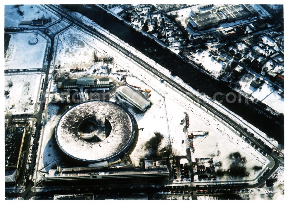 Aerial image Berlin - Wintry snowy research building and office complex Elektronen- Speicherring BESSY - Synchrotronstrahlungsquelle in the district Adlershof in Berlin, Germany