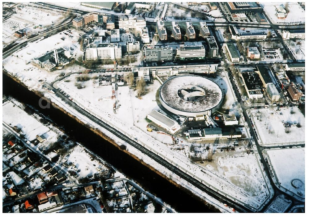 Aerial image Berlin - Wintry snowy research building and office complex Elektronen- Speicherring BESSY - Synchrotronstrahlungsquelle in the district Adlershof in Berlin, Germany