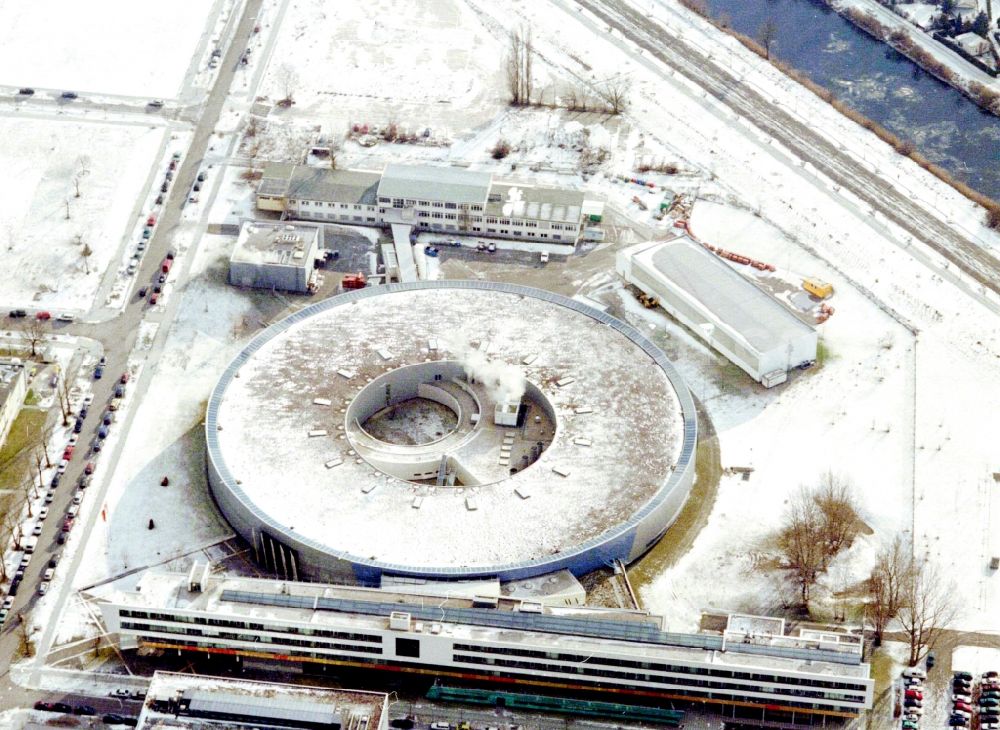 Berlin from above - Wintry snowy research building and office complex Elektronen- Speicherring BESSY - Synchrotronstrahlungsquelle in the district Adlershof in Berlin, Germany