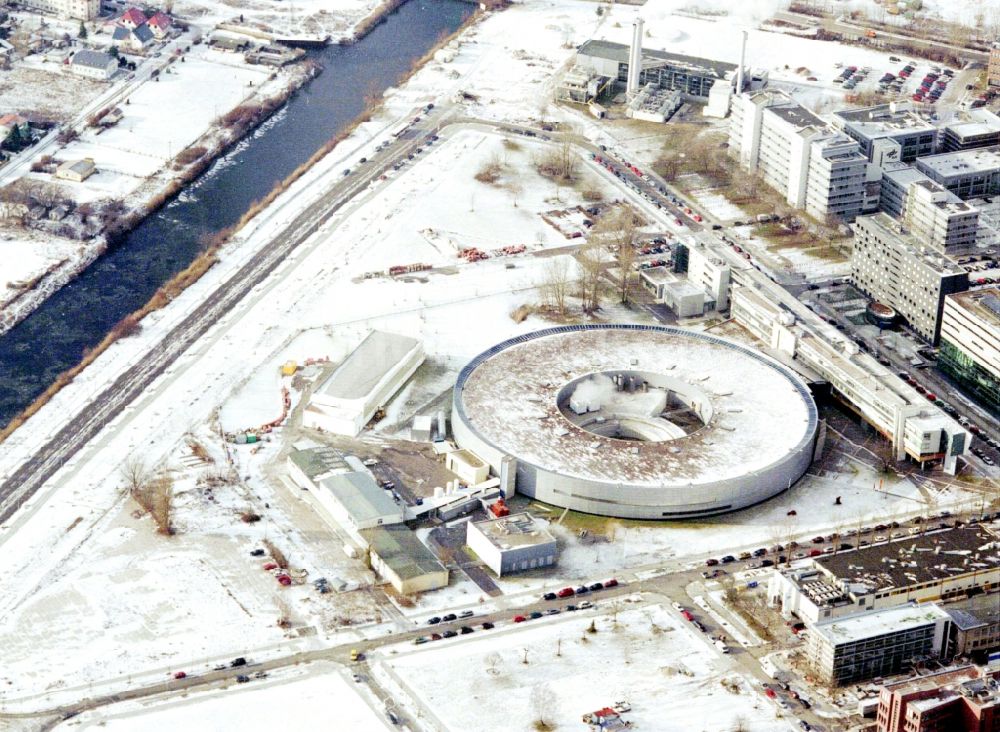 Berlin from above - Wintry snowy research building and office complex Elektronen- Speicherring BESSY - Synchrotronstrahlungsquelle in the district Adlershof in Berlin, Germany