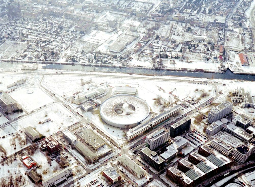 Berlin from the bird's eye view: Wintry snowy research building and office complex Elektronen- Speicherring BESSY - Synchrotronstrahlungsquelle in the district Adlershof in Berlin, Germany