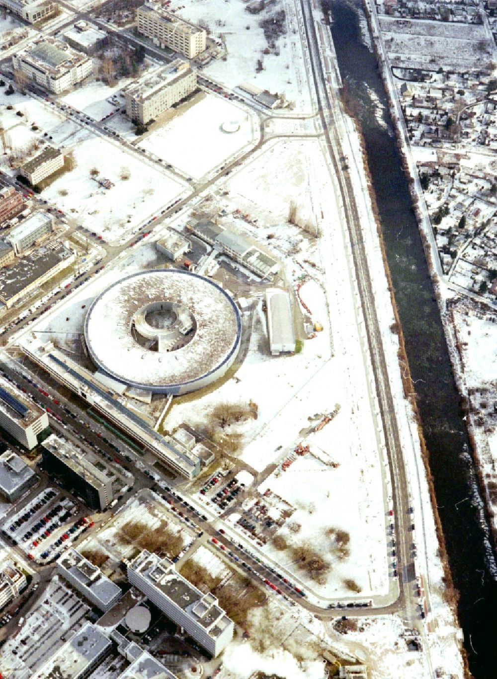 Berlin from the bird's eye view: Wintry snowy research building and office complex Elektronen- Speicherring BESSY - Synchrotronstrahlungsquelle in the district Adlershof in Berlin, Germany