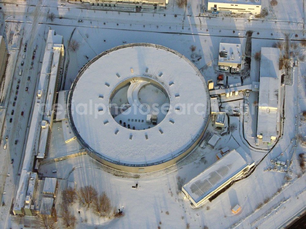 Berlin from the bird's eye view: Wintry snowy research building and office complex Elektronen- Speicherring BESSY - Synchrotronstrahlungsquelle in the district Adlershof in Berlin, Germany