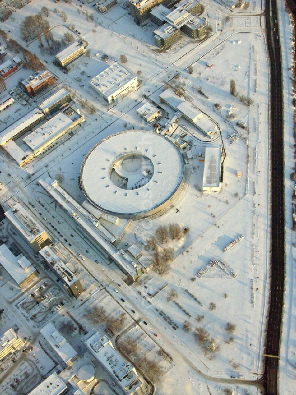 Berlin from above - Wintry snowy research building and office complex Elektronen- Speicherring BESSY - Synchrotronstrahlungsquelle in the district Adlershof in Berlin, Germany