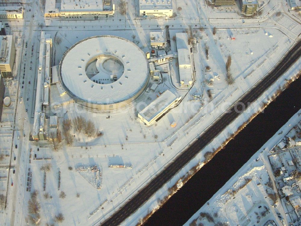 Berlin from the bird's eye view: Wintry snowy research building and office complex Elektronen- Speicherring BESSY - Synchrotronstrahlungsquelle in the district Adlershof in Berlin, Germany