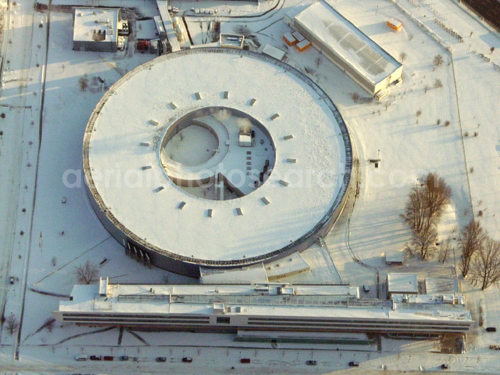 Berlin from above - Wintry snowy research building and office complex Elektronen- Speicherring BESSY - Synchrotronstrahlungsquelle in the district Adlershof in Berlin, Germany