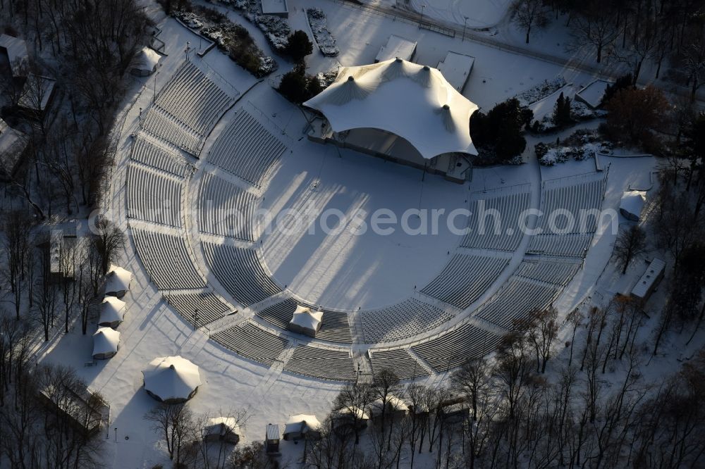 Berlin from above - Wintry snowy Construction of the building of the open-air theater Kindl-Buehne Wuhlheide in Berlin in Germany