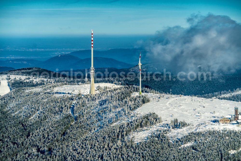 Seebach from above - Wintry snowy radio tower and transmitter on the crest of the mountain range Hornisgrinde in Schwarzwald in Seebach in the state Baden-Wurttemberg, Germany