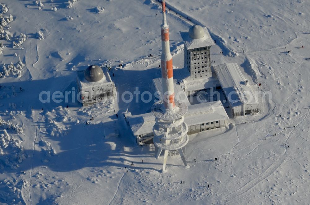 Aerial image Schierke - Wintry snowy radio tower and transmitter on the crest of the mountain range Brocken in Harz in Schierke in the state Saxony-Anhalt, Germany