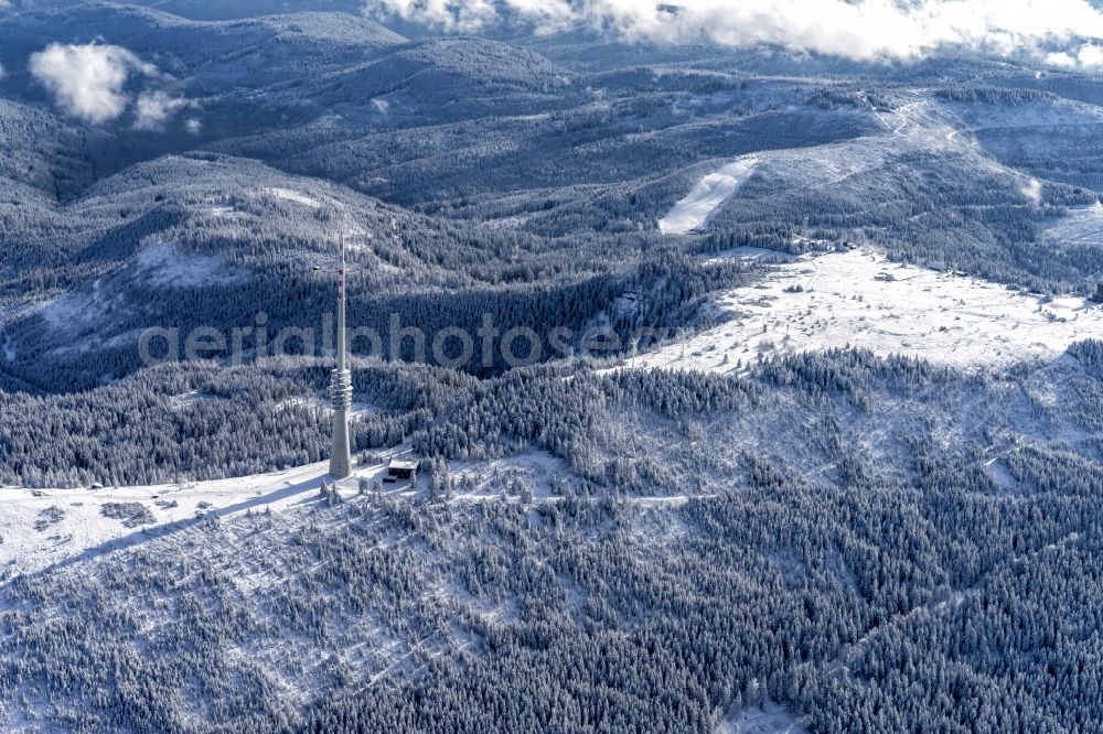 Seebach from the bird's eye view: Wintry snowy Radio tower and transmitter on the crest of the mountain range SWR-Sendeturm on Bergruecken Hornisgrinde in Seebach in the state Baden-Wurttemberg