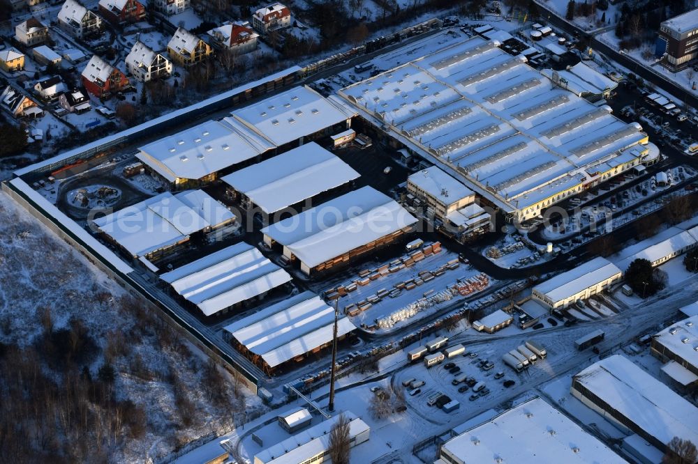 Aerial image Berlin - Wintry snowy building of the construction market of Possling GmbH & Co.KG Mahlsdorf Landsberger Strasse in the district Mahlsdorf in Berlin