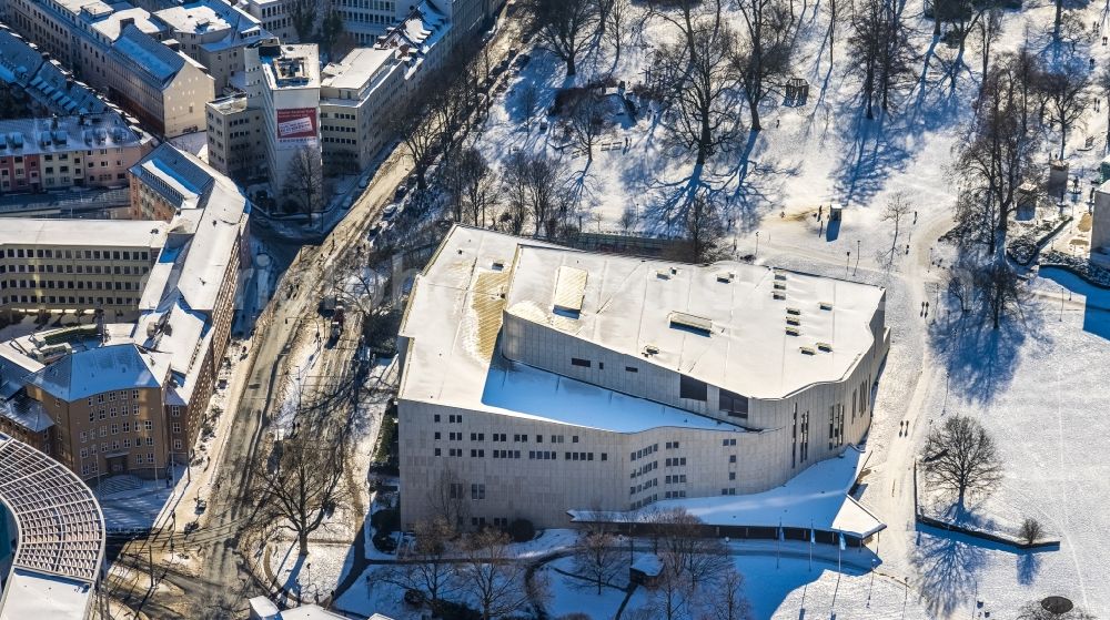 Aerial photograph Essen - Wintry snowy building of the concert hall and theater playhouse in Essen at Ruhrgebiet in the state North Rhine-Westphalia, Germany