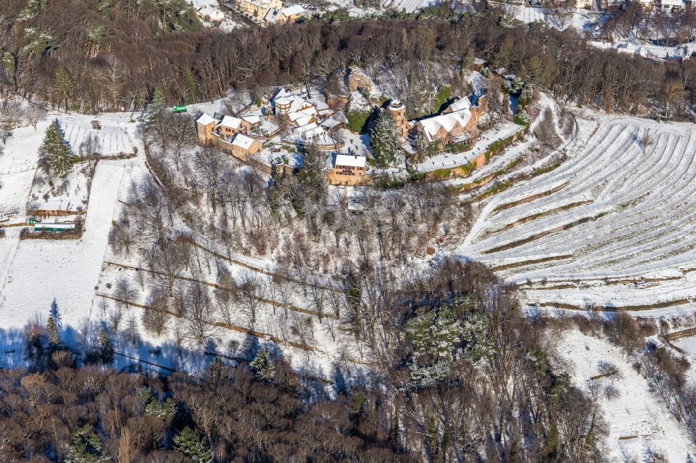 Sankt Martin from above - Wintry snowy building of the restaurant Schloss Kropsburg in Sankt Martin in the state Rhineland-Palatinate, Germany