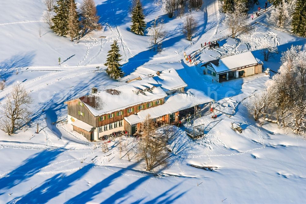 Aerial image Bischofsmais - Wintry snowy Complex of the hotel building Landshuter Haus Oberbreitenau in Bischofsmais in the state Bavaria, Germany