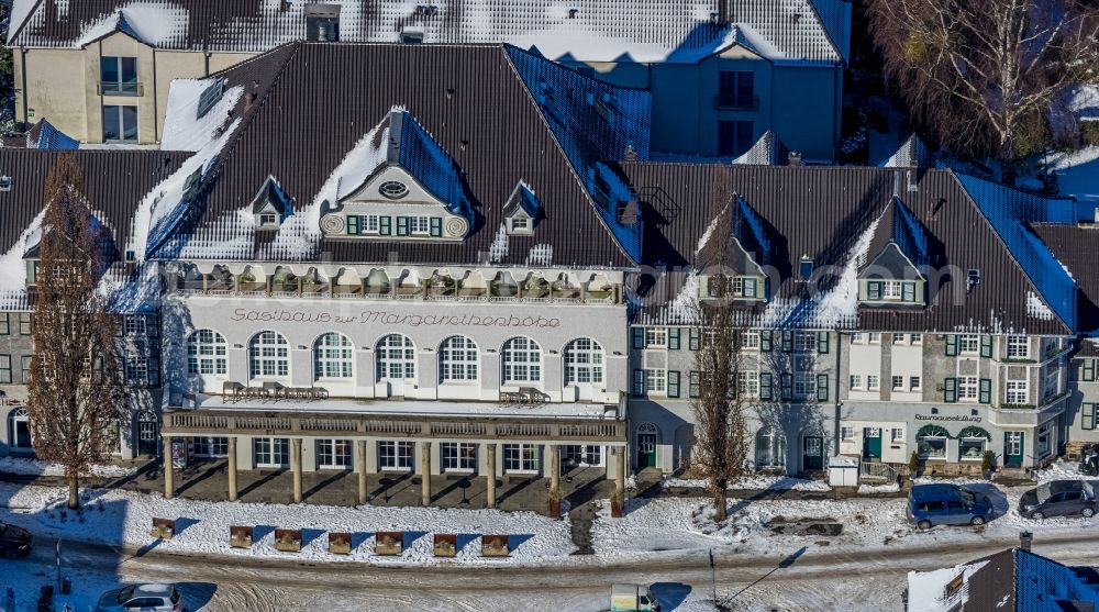 Essen from above - Wintry snowy complex of the hotel building Mintrops Stadt Hotel Margarethenhoehe in the district Margarethenhoehe in Essen at Ruhrgebiet in the state North Rhine-Westphalia, Germany