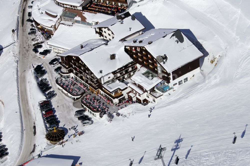 Aerial image Gurgl - Wintry snowy complex of the hotel building Skigebiet Hochgurl-Obergurgl in Gurgl in Tirol, Austria