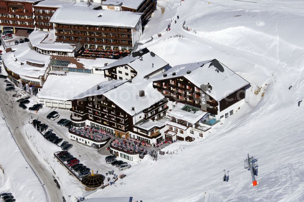 Gurgl from above - Wintry snowy complex of the hotel building Skigebiet Hochgurl-Obergurgl in Gurgl in Tirol, Austria