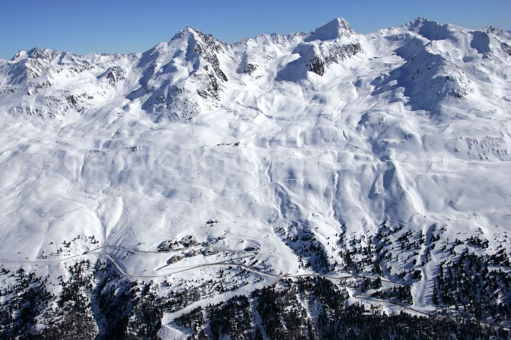 Aerial image Gurgl - Wintry snowy complex of the hotel building Skigebiet Hochgurl-Obergurgl in Gurgl in Tirol, Austria