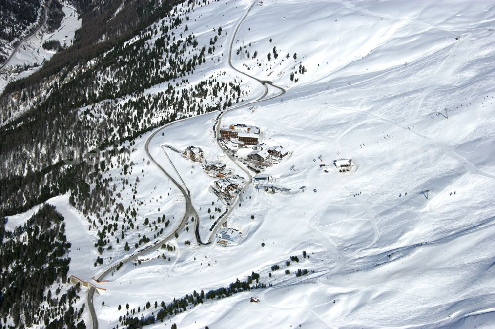 Gurgl from above - Wintry snowy complex of the hotel building Skigebiet Hochgurl-Obergurgl in Gurgl in Tirol, Austria