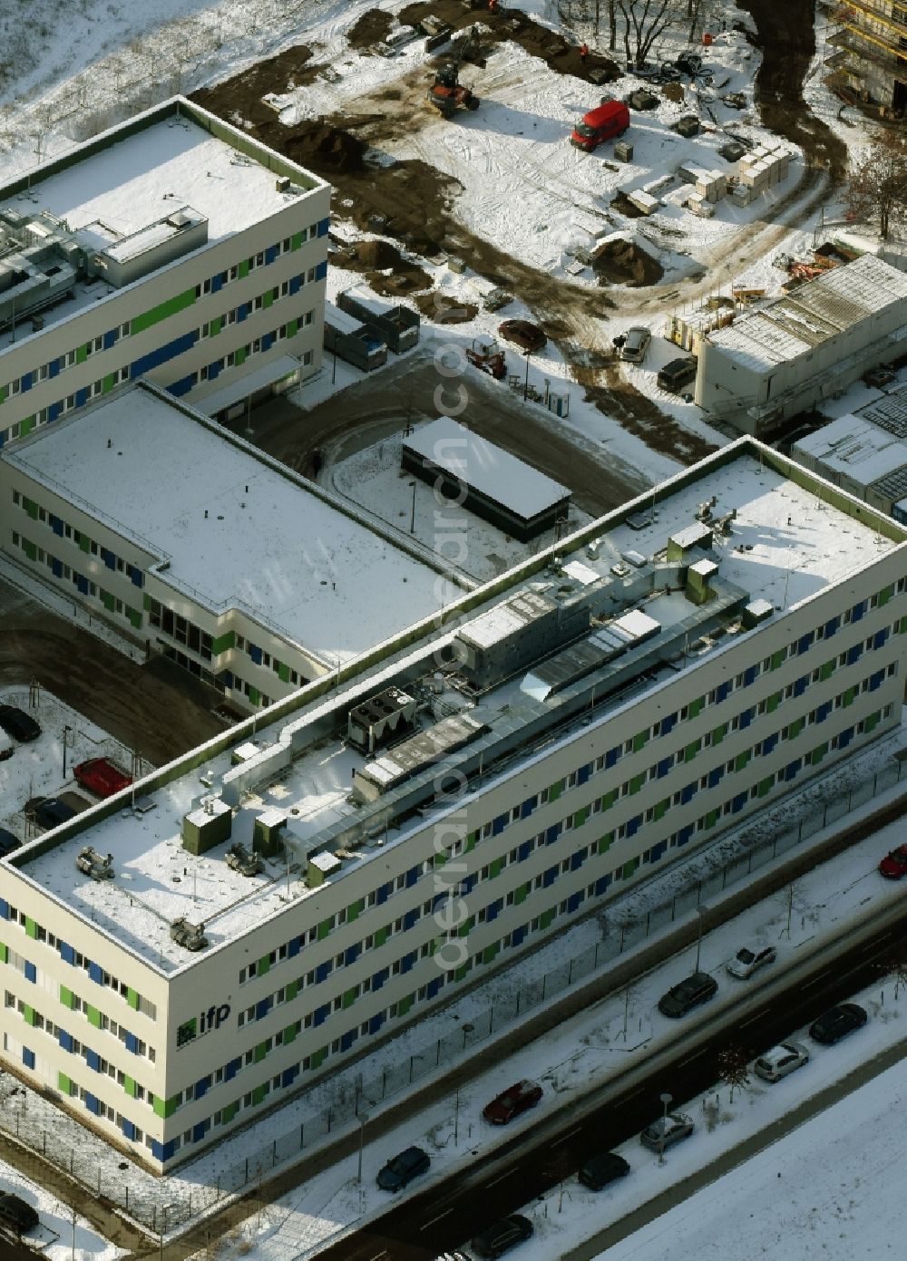 Berlin from the bird's eye view: Wintry snowy Building complex of the Institute ifp Institut fuer Produktqualitaet GmbH in Berlin in Germany