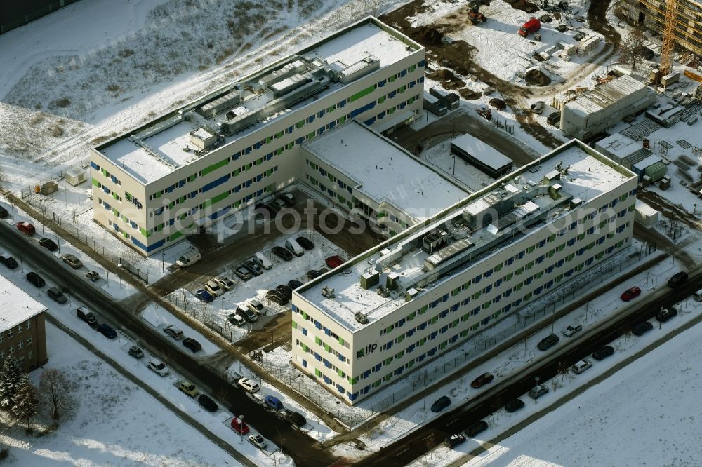 Aerial image Berlin - Wintry snowy Building complex of the Institute ifp Institut fuer Produktqualitaet GmbH in Berlin in Germany