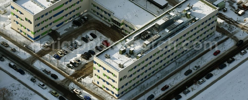 Aerial photograph Berlin - Wintry snowy Building complex of the Institute ifp Institut fuer Produktqualitaet GmbH in Berlin in Germany