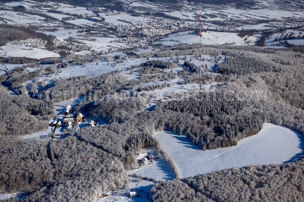 Aerial image Haselbach in der Rhön - Wintry snowy complex of buildings of the monastery Franziskaner Kloster Kreuzberg in Haselbach in der Rhoen at the Rhoen in the state Bavaria, Germany