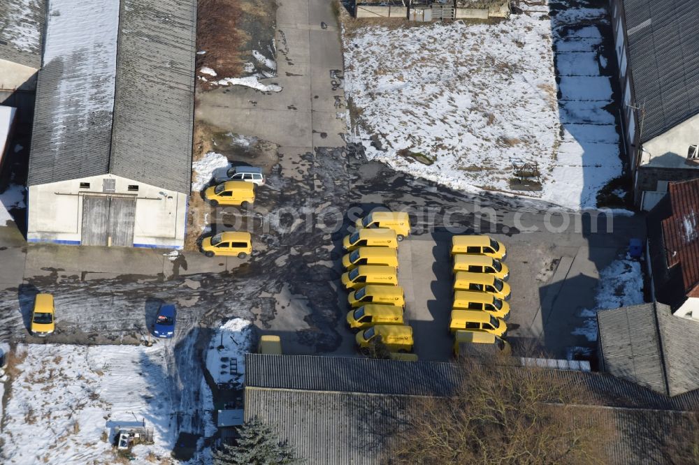 Werneuchen from above - Wintry snowy Building complex and distribution center on the site of Deutschen Post - DHL on Freienwalder Strasse in Werneuchen in the state Brandenburg