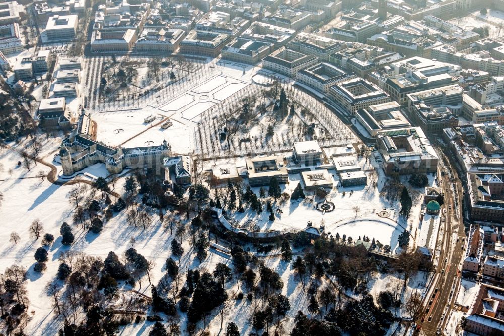 Aerial image Karlsruhe - Wintry snowy Building complex in the park of the castle Schloss Karlsruhe in Karlsruhe in the state Baden-Wuerttemberg, Germany