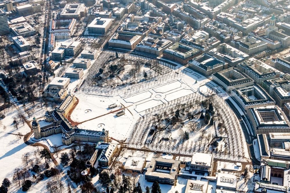 Aerial photograph Karlsruhe - Wintry snowy Building complex in the park of the castle Schloss Karlsruhe in Karlsruhe in the state Baden-Wuerttemberg, Germany