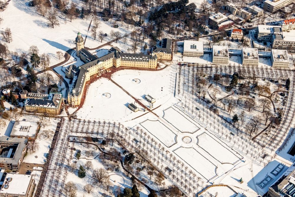 Aerial image Karlsruhe - Wintry snowy Building complex in the park of the castle Schloss Karlsruhe in Karlsruhe in the state Baden-Wuerttemberg, Germany