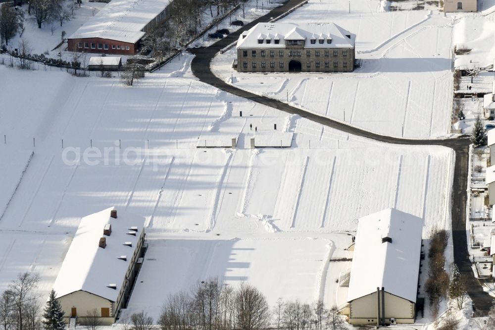 Flossenbürg from the bird's eye view: Wintry snowy tourist attraction of the historic monument KZ-Gedenkstaette Flossenbuerg on Gedaechtnisallee in Flossenbuerg in the state Bavaria, Germany