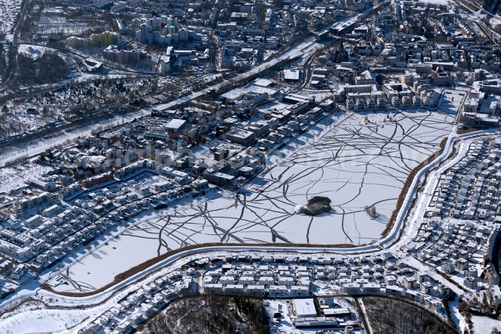 Aerial image Dortmund - Wintry snowy traces on the frozen and ice-covered water surface PhoenixSee in the district Hoerde in Dortmund at Ruhrgebiet in the state North Rhine-Westphalia, Germany