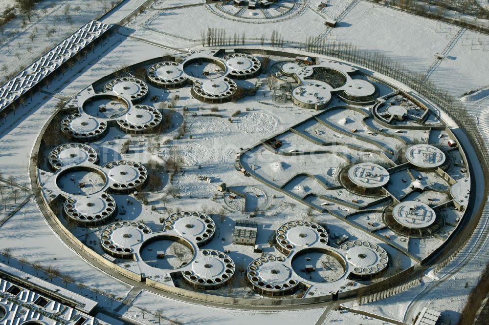 Aerial image Berlin - Wintry snowy site of the animal shelter, also known as the city of animals, destrict Hohenschoenhausen in Berlin in Germany