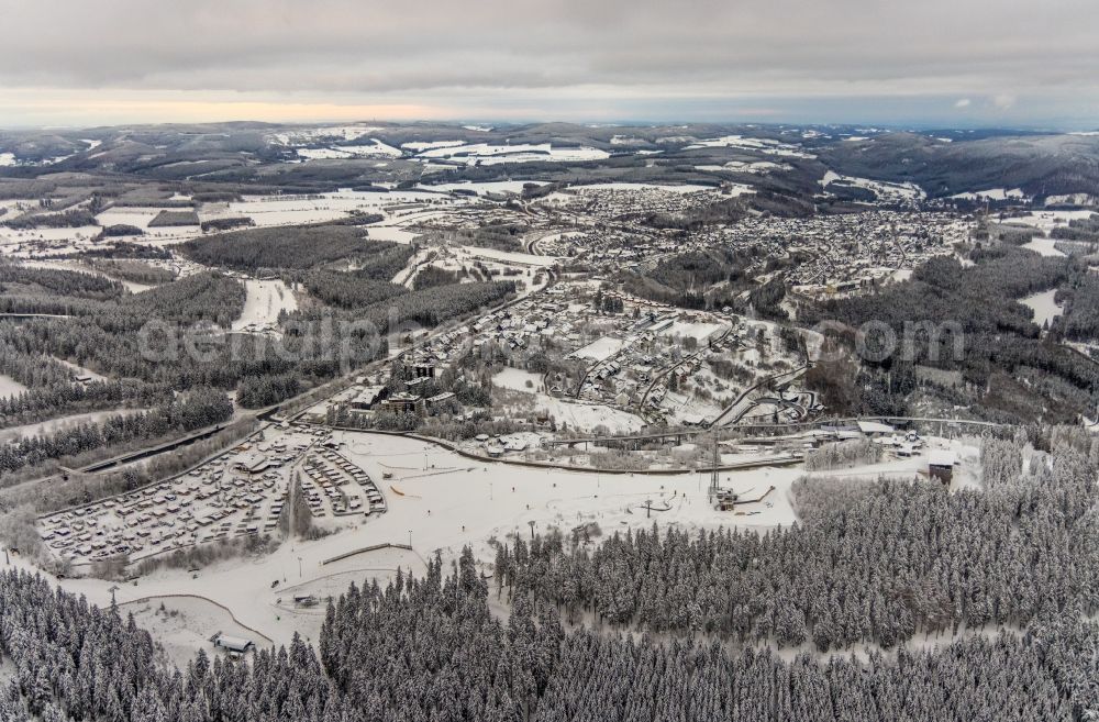 Winterberg from above - Wintry snowy city area with outside districts and inner city area in Winterberg at Sauerland in the state North Rhine-Westphalia, Germany