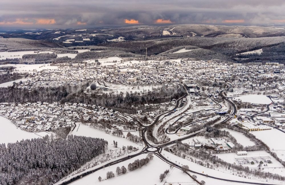 Aerial image Winterberg - Wintry snowy city area with outside districts and inner city area in Winterberg at Sauerland in the state North Rhine-Westphalia, Germany