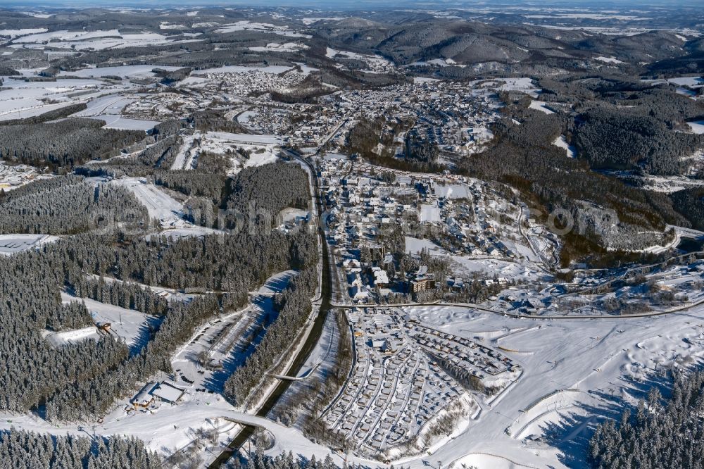 Aerial photograph Winterberg - Wintry snowy city area with outside districts and inner city area in Winterberg at Sauerland in the state North Rhine-Westphalia, Germany