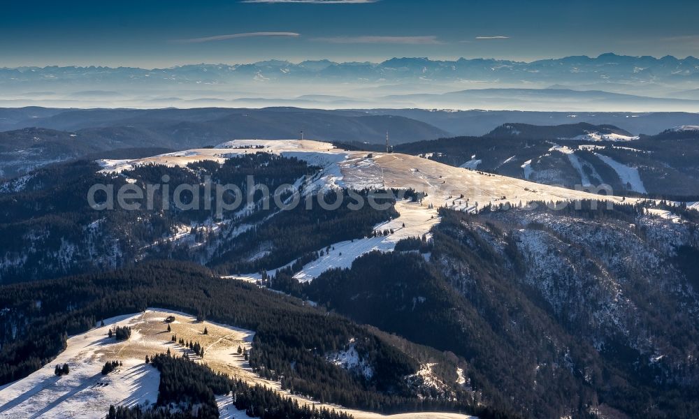 Feldberg (Schwarzwald) from the bird's eye view: Wintry snowy Rocky and mountainous landscape of Feldberg in Feldberg (Schwarzwald) in the state Baden-Wuerttemberg