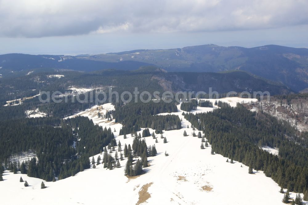 Aerial image Feldberg (Schwarzwald) - Wintry snowy rocky and mountainous landscape in Feldberg (Schwarzwald) at Schwarzwald in the state Baden-Wuerttemberg, Germany