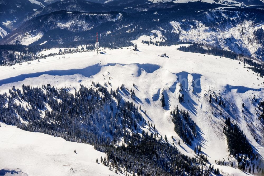 Aerial image Feldberg (Schwarzwald) - Wintry snowy rocky and mountainous landscape in Feldberg (Schwarzwald) at Schwarzwald in the state Baden-Wuerttemberg, Germany