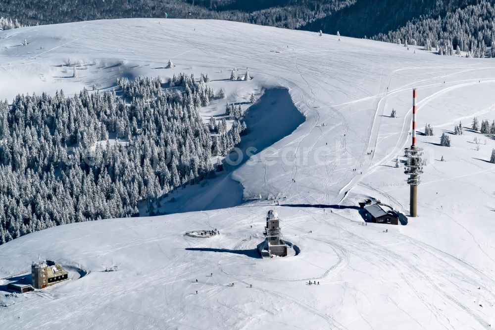 Feldberg (Schwarzwald) from the bird's eye view: Wintry snowy rocky and mountainous landscape in Feldberg (Schwarzwald) at Schwarzwald in the state Baden-Wuerttemberg, Germany