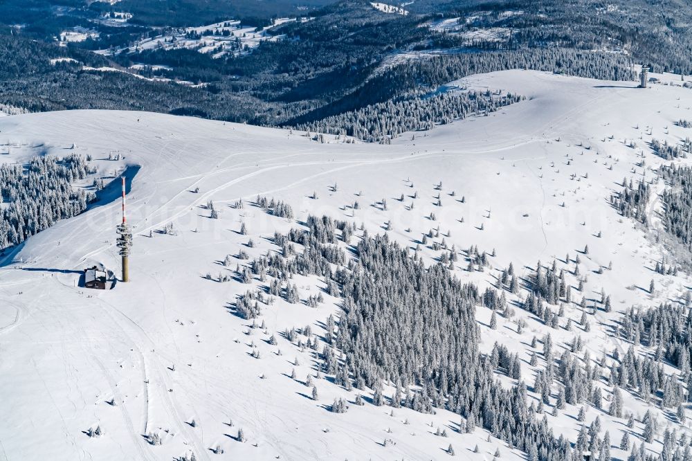 Feldberg (Schwarzwald) from the bird's eye view: Wintry snowy rocky and mountainous landscape in Feldberg (Schwarzwald) at Schwarzwald in the state Baden-Wuerttemberg, Germany