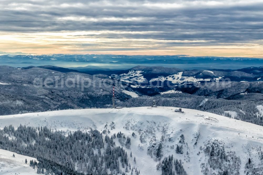 Feldberg (Schwarzwald) from the bird's eye view: Wintry snowy rocky and mountainous landscape in Feldberg (Schwarzwald) at Schwarzwald in the state Baden-Wuerttemberg, Germany