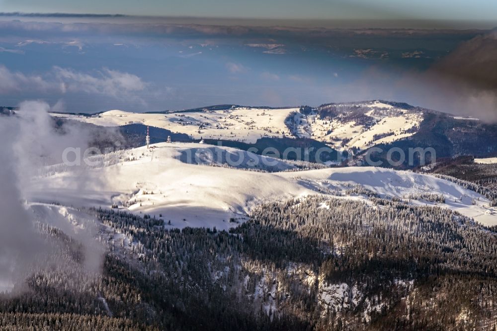 Feldberg (Schwarzwald) from above - Wintry snowy rocky and mountainous landscape in Feldberg (Schwarzwald) at Schwarzwald in the state Baden-Wuerttemberg, Germany