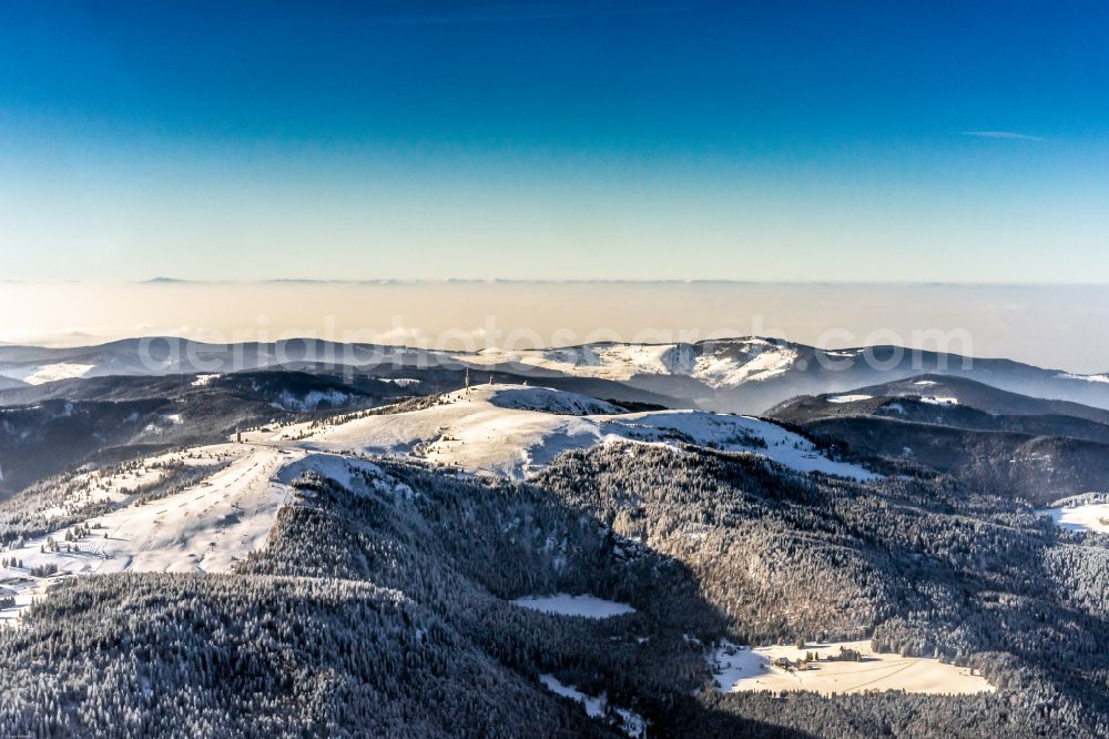 Feldberg (Schwarzwald) from above - Wintry snowy rocky and mountainous landscape in Feldberg (Schwarzwald) at Schwarzwald in the state Baden-Wuerttemberg, Germany