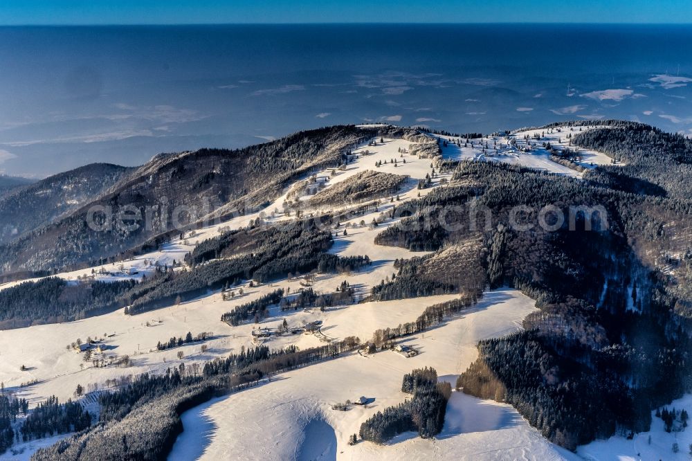 Waldkirch from above - Wintry snowy Rocky and mountainous landscape of Kandel in the district Sankt Peter in Waldkirch in the state Baden-Wuerttemberg